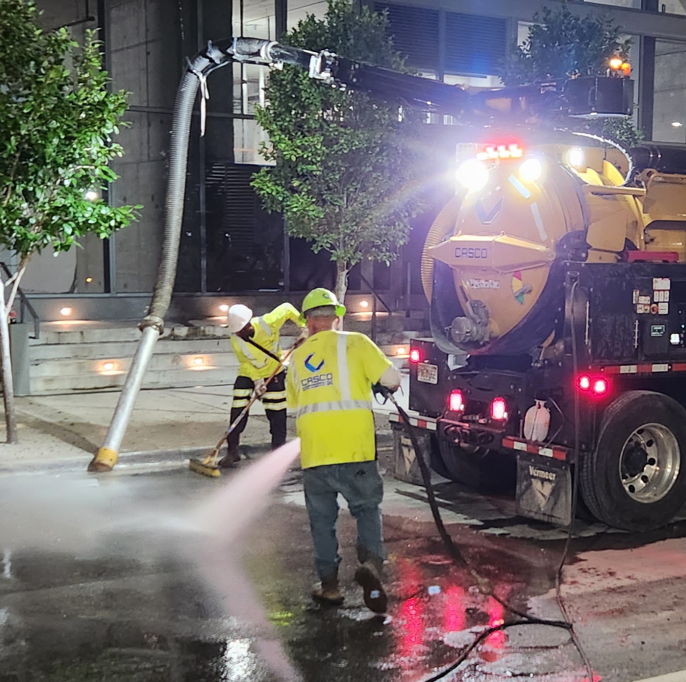 Envirocon field crew working with vacuum equipment
